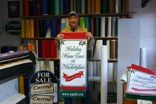 Vertical banners held by a customer