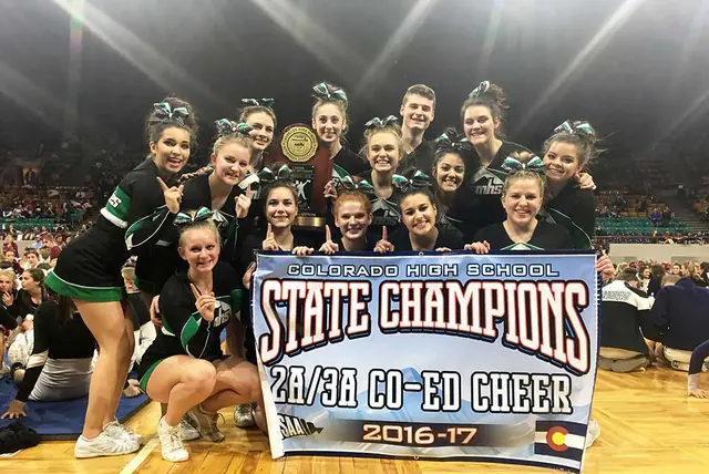 State champions cheer team banner
