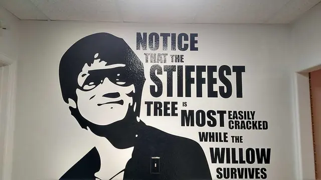 Vinyl wall quote graphic with portrait artwork