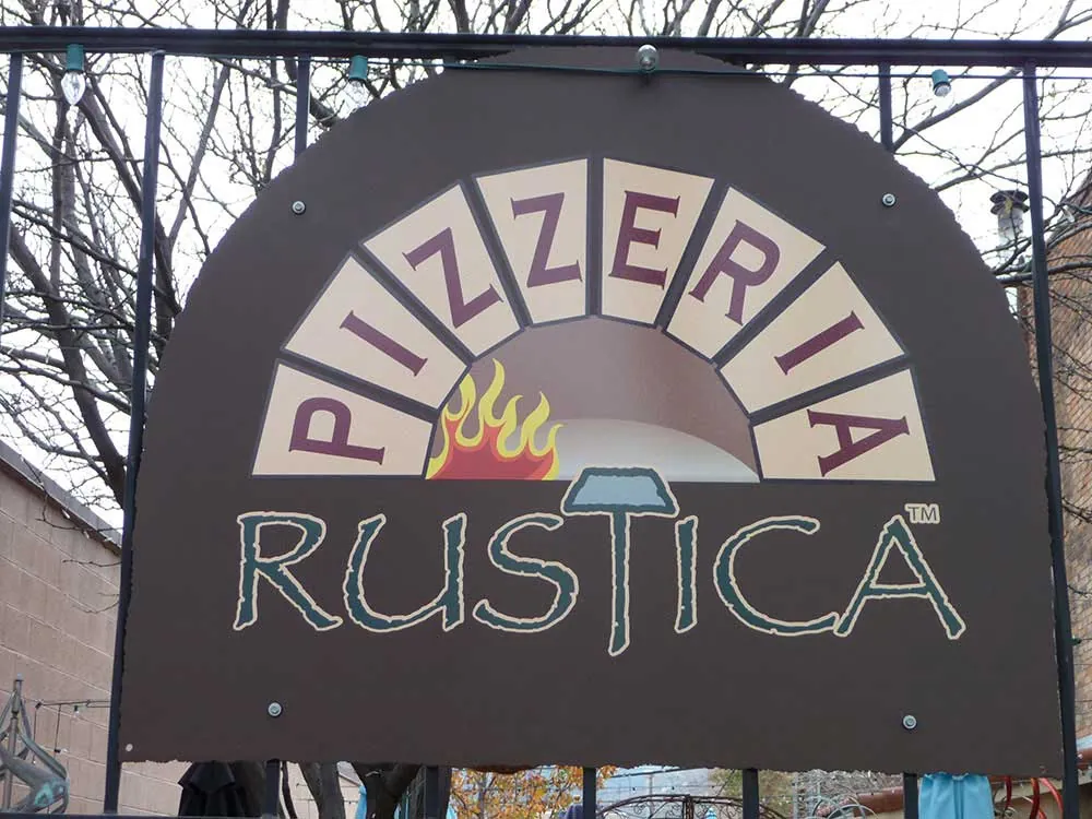 Pizzeria Rustica arched restaurant sign