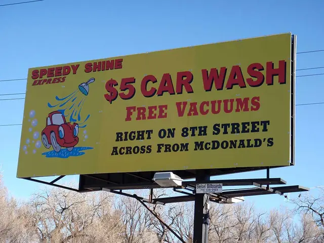 Car wash billboard in bright yellow