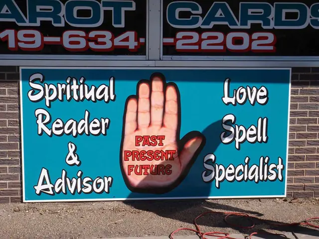 Spiritual reader storefront sign with hand graphic