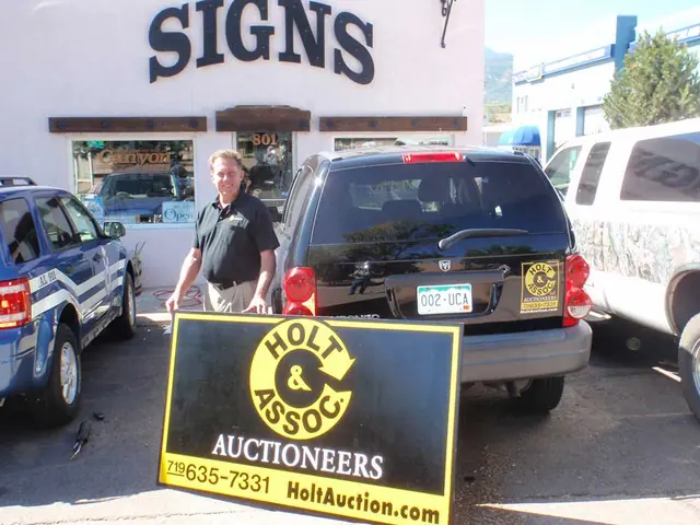 Auctioneers sign displayed outside the sign shop