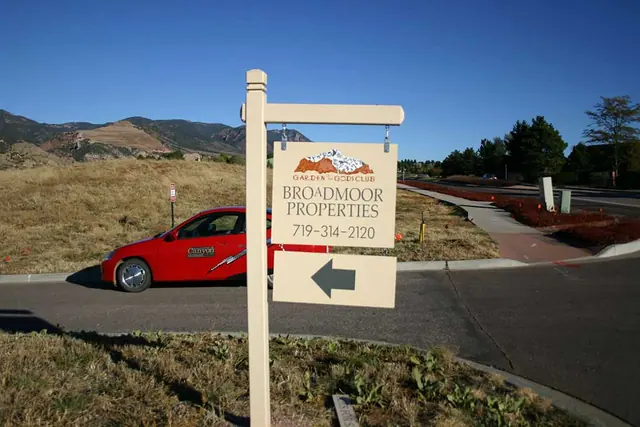 Real estate post sign at a home site