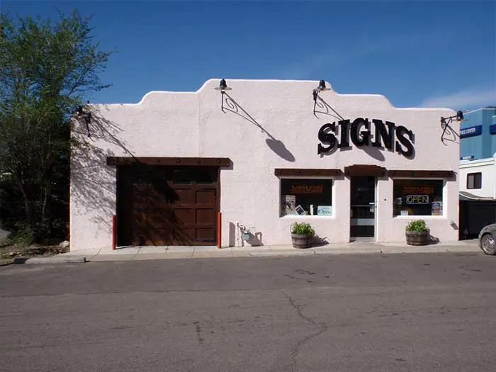 Colorado Canyon Signs shop building with SIGNS lettering in Colorado Springs