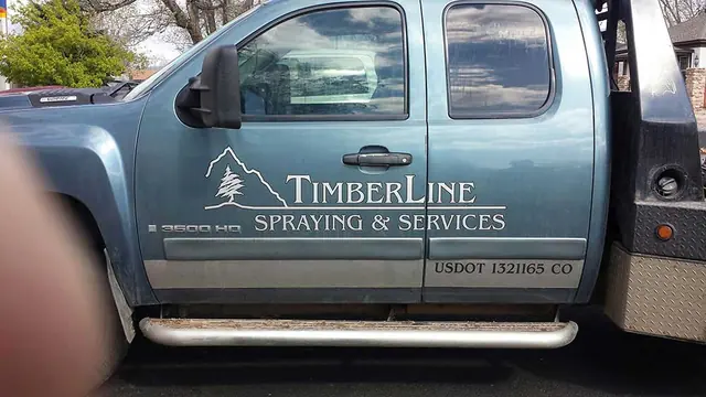 Pickup door lettering for a landscaping company