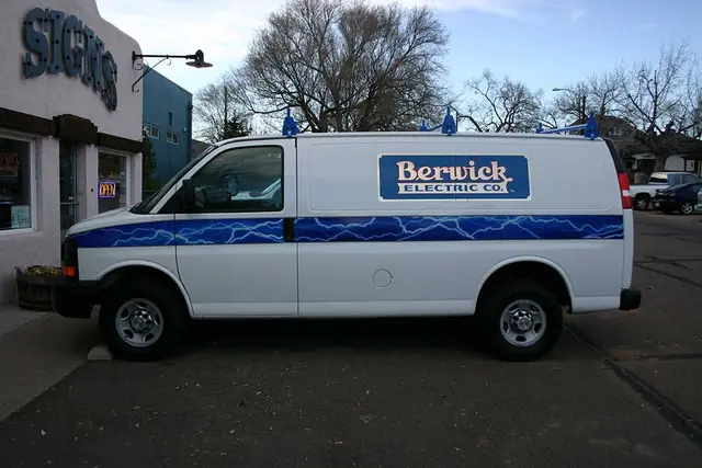 Service van with striping and logo