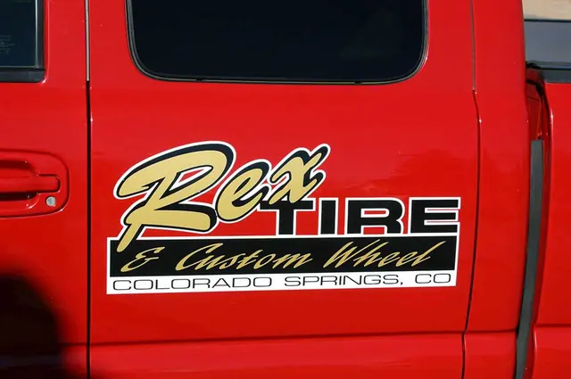 Rex Tire and Custom Wheel truck door logo
